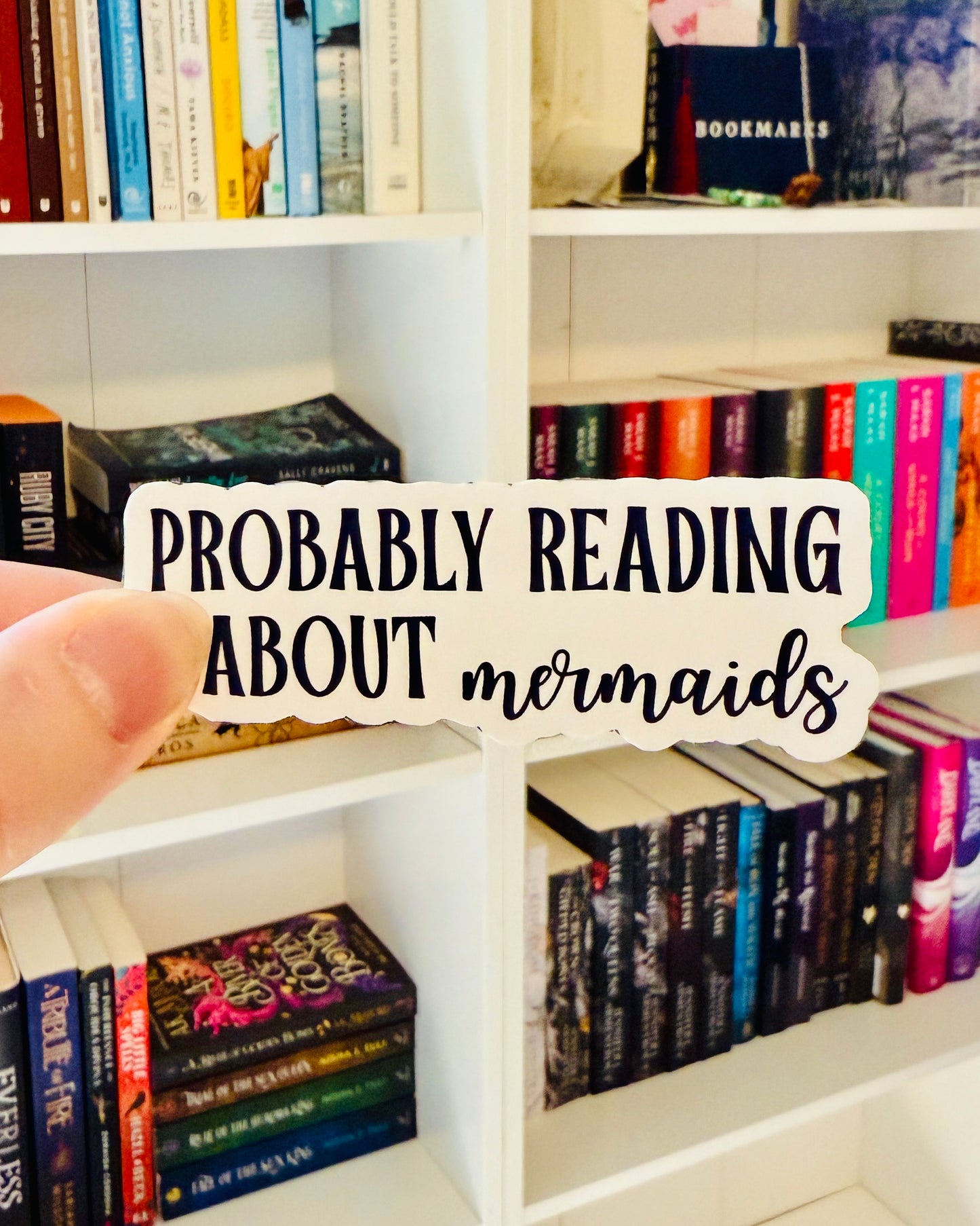 Reading About Mermaids Sticker